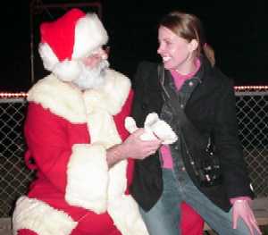 Lisa Ray a reporter with the Texas City Sun with Santa